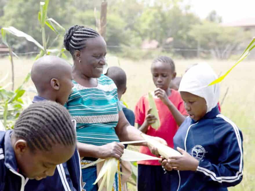 Steiner School Mbagathi: Gardening teacher Rose M Ingala with pupils
