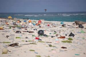 Marine debris that was washed ashore covers a beach on Laysan Island in the Hawaiian Islands National Wildlife Refuge. (Susan White/USFWS)