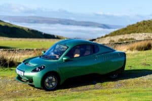 Riversimple Rasa hydrogen car, pictured in green in Welsh countryside