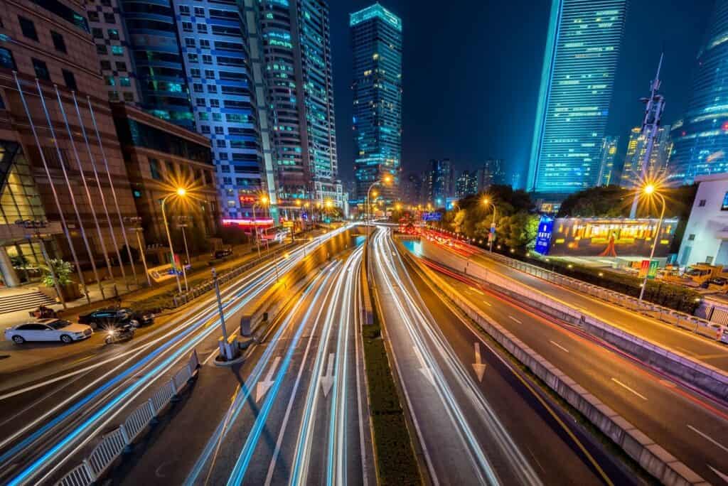 Night shot of city with traffic light trails.