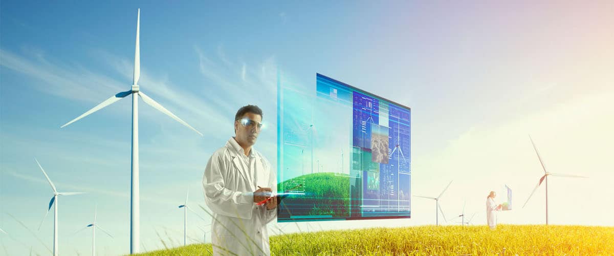 Illustration showing wind turbines in field, plus technicians in lab coats and floating digital computer screen — high tech image of clean power.