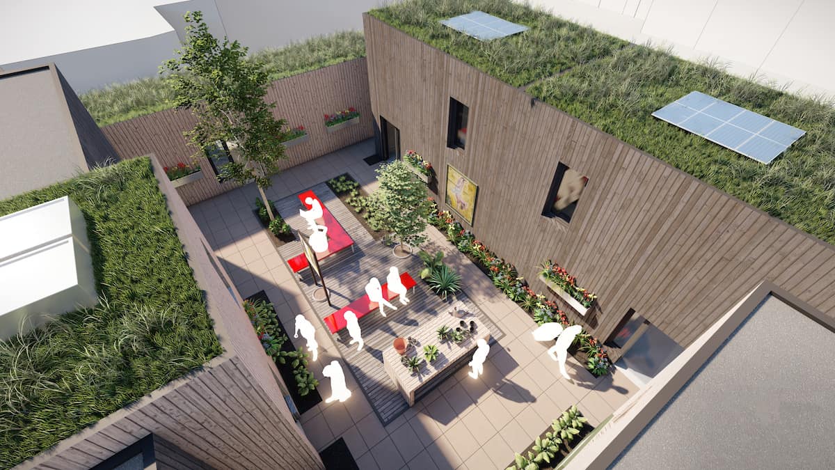 Artist's impression of rooftop offsite project developed by Agile Homes for Emmaus Bristol, as seen from above, showing green roofs and outdoor amenity space.