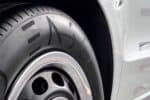 Close-up of ENSO tyre on car wheel.