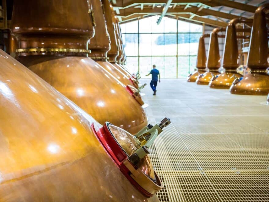 Interior of The Glenlivet distillery, in Speyside, Scotland, showing lantern-shaped copper stills.