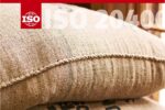 Detail from front of ISO report, showing coffee sacks, with ISO logo and 20400 superimposed over top of image.