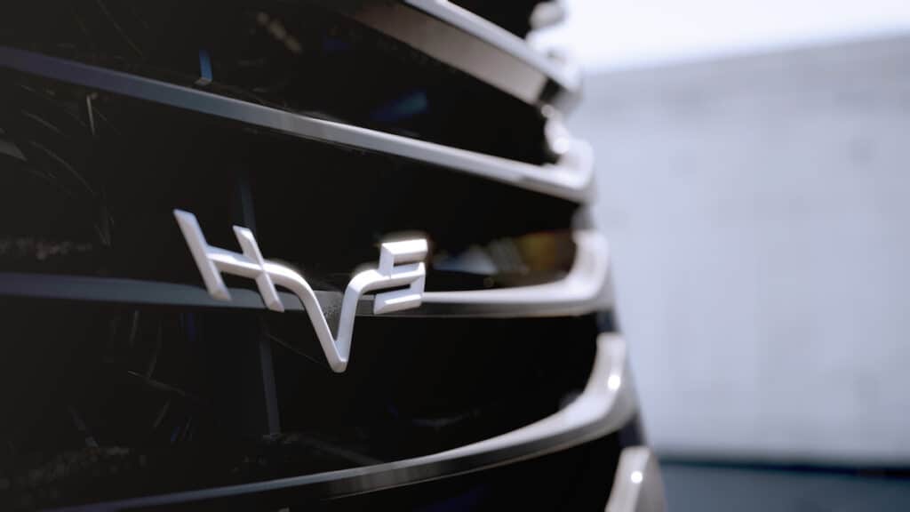 Close-up of HGV front grille, showing HVS logo.