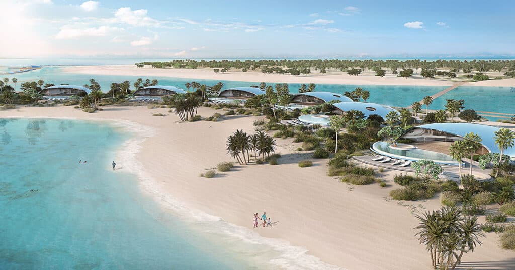 Shot of sands at Sheybarah Island resort, with canopies, pools and loungers for holidaymakers.