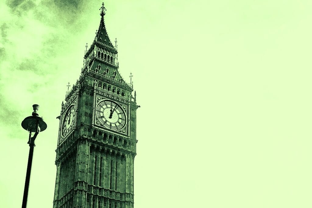 Big Ben clock tower at Houses of Parliament, London, shot in black and white, but with green filter.