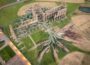 Aerial view of land art installation in and around ruins of Whitby Abbey, with hands drawn holding roots of tree in natural earth greens and browns.