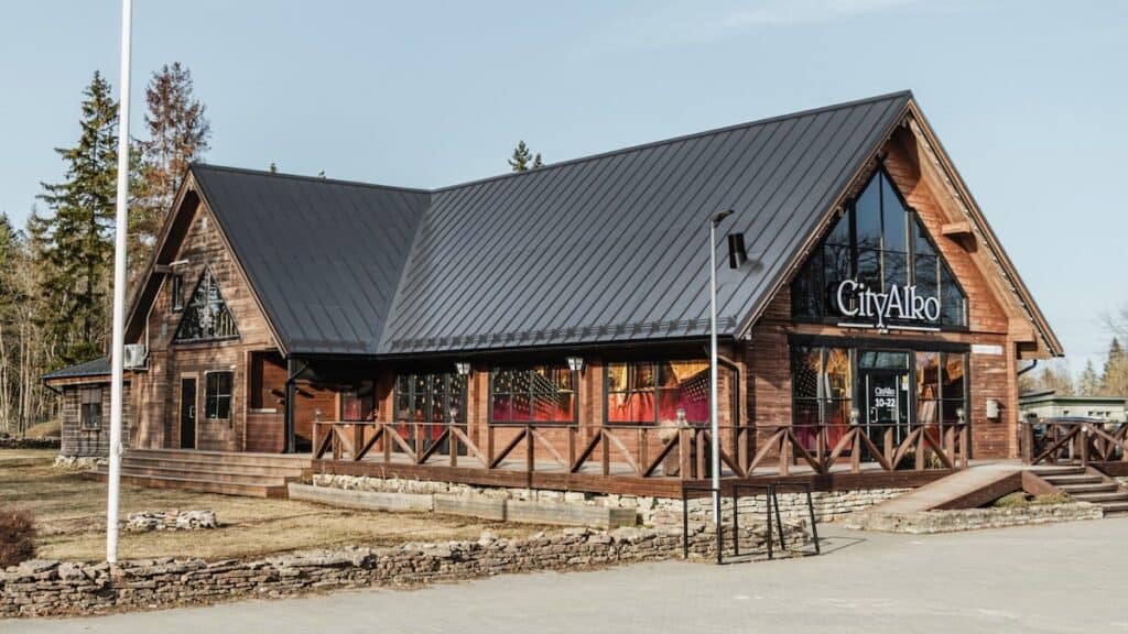 Mock-up of timber CityAlko store with solar roof in Iron Grey to match colour palette of traditional architecture of Northern Europe.