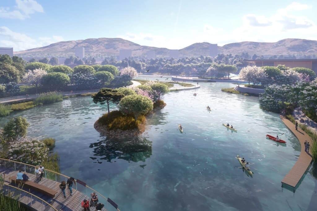 Illustration shows large lake development with mountains behind, tree islands in centre, canoes on water, pedestrians on walkways and bridges.